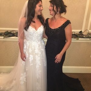 Mother of the bride gown with train that bustles